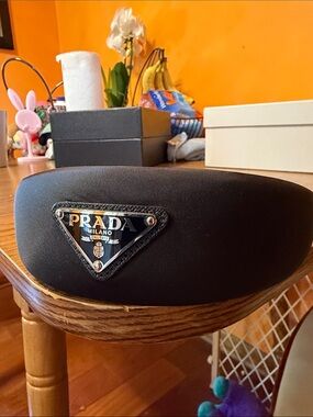 Prada Black Logo Headband with Triangle Plaque model comfortable, and luxury
